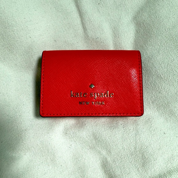 kate spade Handbags - Kate Spade Red Trifold Wallet NWT